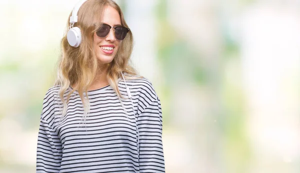 Beautiful Young Blonde Woman Wearing Headphones Sunglasses Isolated Background Looking — Stock Photo, Image