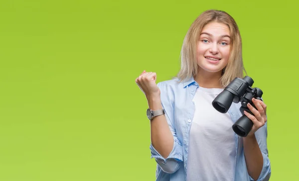 Young Caucasian Woman Holding Binoculars Isolated Background Screaming Proud Celebrating — Stock Photo, Image