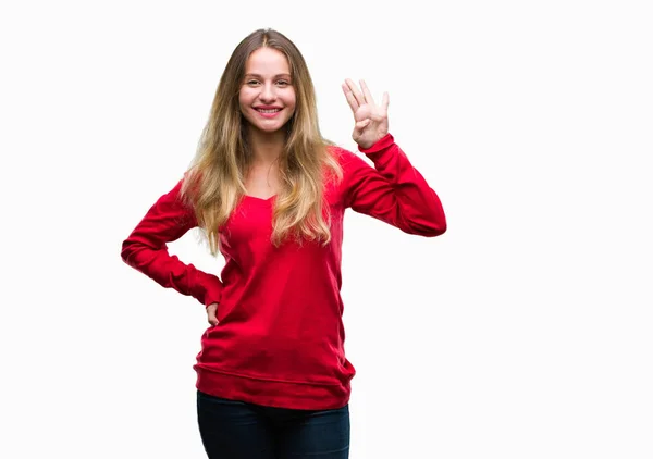 年轻美丽的金发女子穿着红色毛衣在孤立的背景显示和指向与手指数字四同时微笑自信和快乐 — 图库照片
