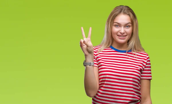 Young Caucasian Woman Isolated Background Showing Pointing Fingers Number Two — Stock Photo, Image
