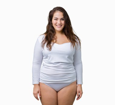 Artı boyutu genç overwight kadın güzel üzerinde beyaz iç çamaşırı giyiyor arka yüzünde mutlu ve güzel bir gülümseme ile izole. Şanslı kişi.