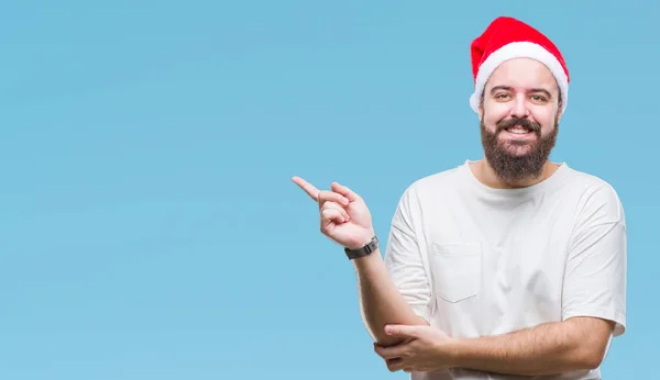 Young Caucasian Hipster Man Wearing Christmas Hat Isolated Background Big — Stock Photo, Image
