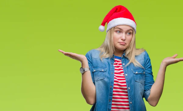 Jonge Kaukasische Vrouw Kerstmuts Dragen Geïsoleerde Achtergrond Clueless Verward Expressie — Stockfoto