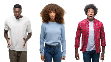 Afrika kökenli Amerikalı grup izole arka plan korkuyor ve şok sürpriz ifade, korku ve heyecan yüz üzerinden insan kolaj.