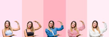 Kolaj pembe çizgili genç güzel kadın bir arka plan ile büyük ve büyük boy işaret, ölçü birimi sembol gösteren el eller izole. Kameraya bakarak gülümsüyordu. Ölçüm kavramı.