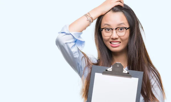 Young Asian Business Woman Holding Clipboard Isolated Background Stressed Hand — Stock Photo, Image