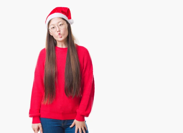 Young Chinese Woman Isolated Background Wearing Christmas Hat Making Fish — Stock Photo, Image