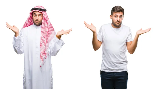 ハンサムな若い男と腕と手を上げて分離背景無知と混乱式に対するアラブ人のコラージュ 疑いのコンセプト — ストック写真