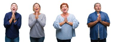 Kolaj yalvarıyor ve umut ifade yüzünde çok duygusal ve endişe ile birlikte elleriyle dua izole arka plan üzerindeki üst düzey kişiler ve zarif orta yaş grubunun. Bağışlanmak. Din kavramı.