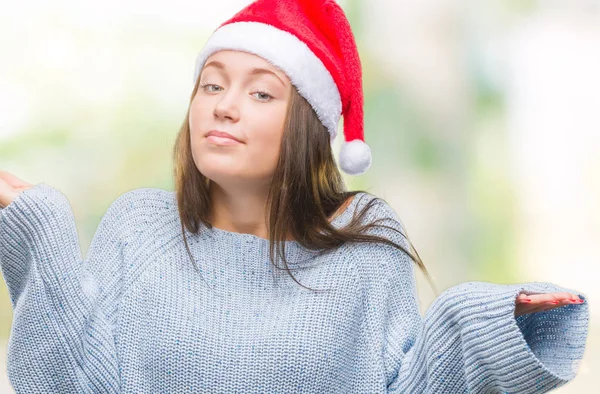 Mooie Kaukasische Jongedame Kerstmuts Dragen Geïsoleerde Achtergrond Clueless Verward Expressie — Stockfoto