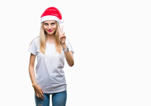 Joven Hermosa Mujer Rubia Sombrero Navidad Sobre Fondo Aislado Sonriendo — Foto de Stock