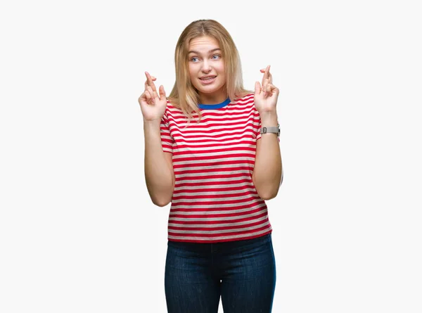 Young Caucasian Woman Isolated Background Smiling Crossing Fingers Hope Eyes — Stock Photo, Image