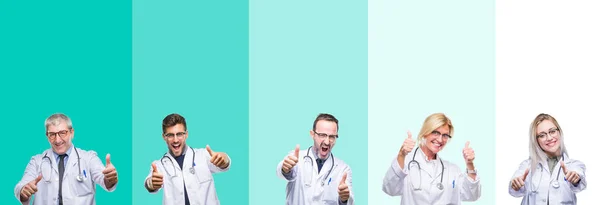 在五颜六色的孤立背景下佩戴听诊器的一组医生赞成用手做积极的手势 竖起大拇指微笑 为成功而高兴 看着镜头 赢家的手势 — 图库照片