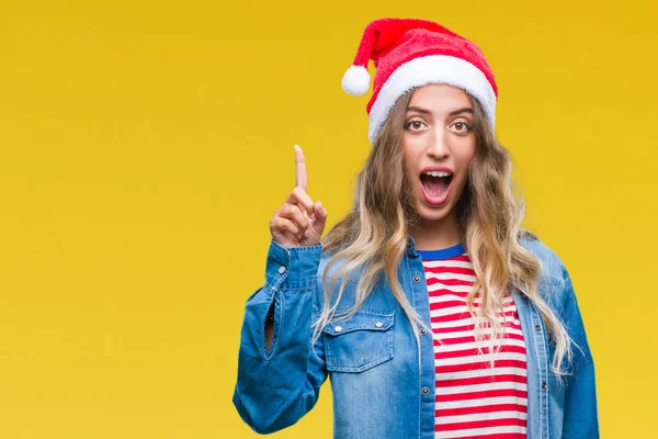 Linda Jovem Loira Vestindo Chapéu Natal Sobre Fundo Isolado Apontando — Fotografia de Stock