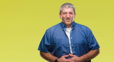 Yakışıklı üst düzey adam izole mide üzerinde el ile arka plan çünkü hazımsızlık, ağrılı hastalık hasta hissediyor. Ağrısı kavramı.