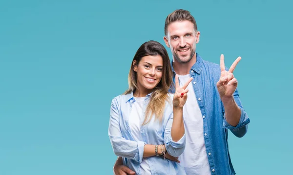 Pareja Joven Enamorada Sobre Fondo Aislado Sonriendo Con Cara Feliz —  Fotos de Stock