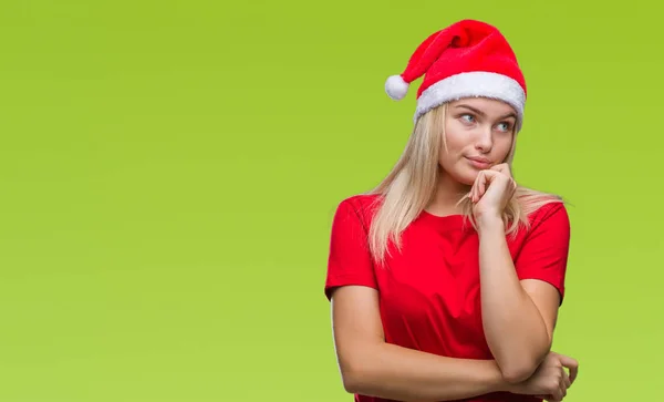 Junge Kaukasische Frau Mit Weihnachtsmütze Über Isoliertem Hintergrund Mit Der — Stockfoto