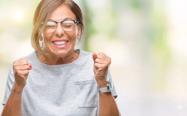 Middelbare Leeftijd Senior Spaanse Vrouw Bril Geïsoleerde Achtergrond Enthousiast Voor — Stockfoto