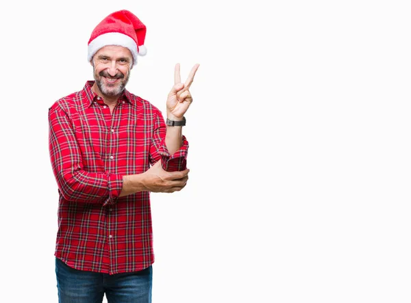 Hombre Mediana Edad Con Sombrero Navidad Sobre Fondo Aislado Sonriendo — Foto de Stock