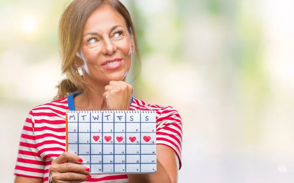 Mulher Hispânica Sênior Meia Idade Segurando Calendário Menstruação Sobre Fundo — Fotografia de Stock