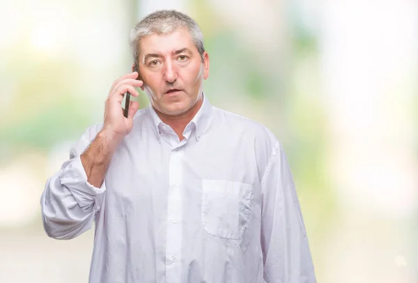 Handsome Senior Man Talking Smartphone Isolated Background Confident Expression Smart — Stock Photo, Image