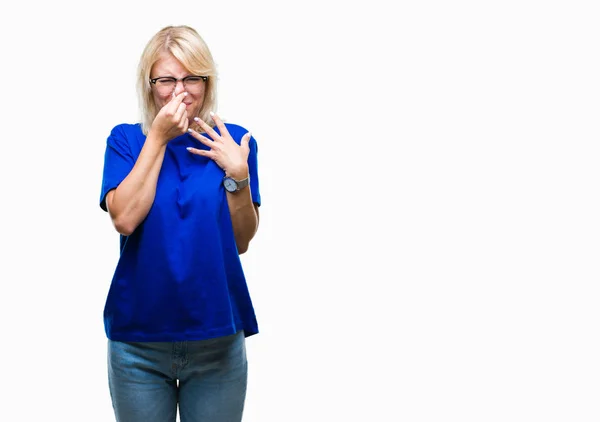 Young Beautiful Blonde Woman Wearing Glasses Isolated Background Smelling Something — Stock Photo, Image