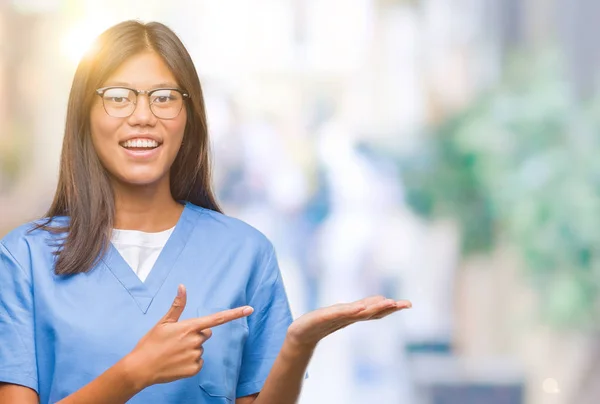 Young Asian Doctor Woman Isolated Background Amazed Smiling Camera While — Stock Photo, Image