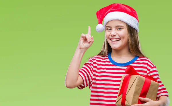 Menina Bonita Nova Vestindo Chapéu Natal Segurando Presente Sobre Fundo — Fotografia de Stock