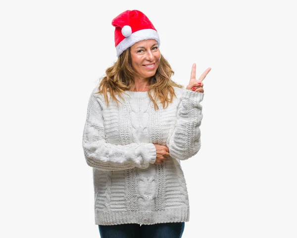 Ältere Hispanische Frau Mittleren Alters Mit Weihnachtsmütze Vor Isoliertem Hintergrund — Stockfoto