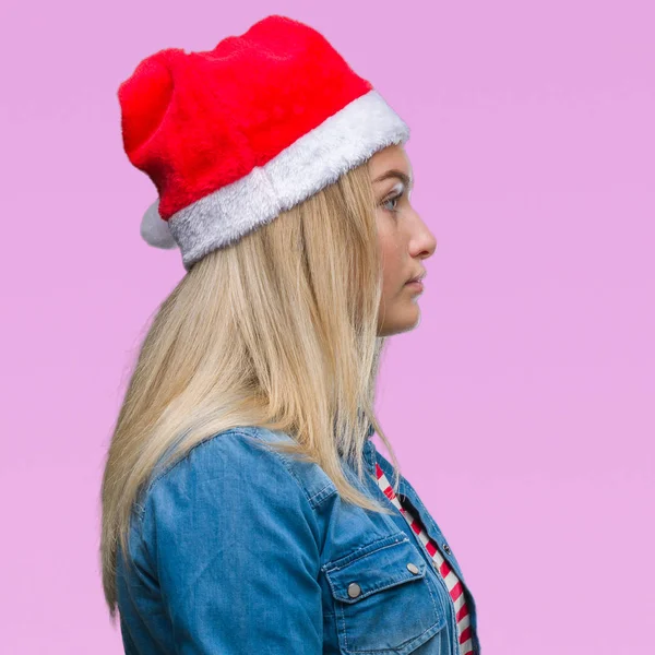 Jonge Kaukasische Vrouw Dragen Kerstmuts Geïsoleerde Achtergrond Zoek Naar Kant — Stockfoto