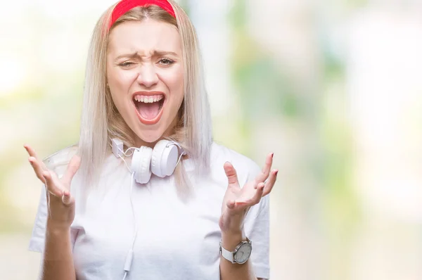 Junge Blonde Frau Mit Kopfhörer Musik Über Isolierten Hintergrund Verrückt — Stockfoto