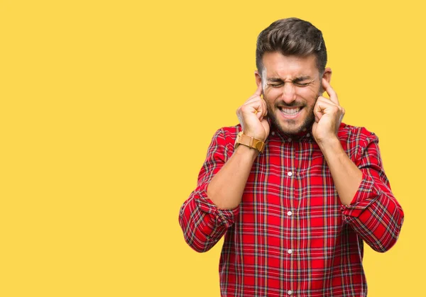 Joven Hombre Guapo Sobre Fondo Aislado Cubriendo Las Orejas Con —  Fotos de Stock