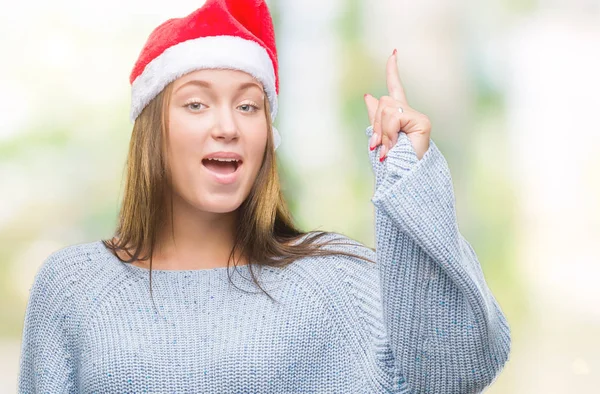 Mooie Kaukasische Jongedame Kerstmuts Dragen Geïsoleerd Achtergrond Vinger Omhoog Met — Stockfoto