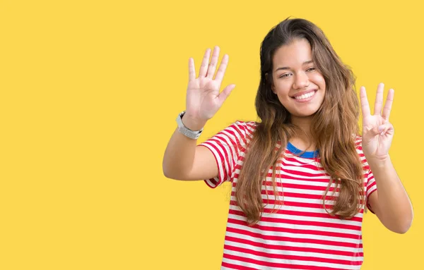 Joven Mujer Morena Hermosa Con Rayas Camiseta Sobre Fondo Aislado — Foto de Stock