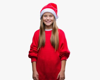 Üzerinde Noel şapka giyen genç güzel kız arka yüzünde mutlu ve güzel bir gülümseme ile izole. Şanslı kişi.