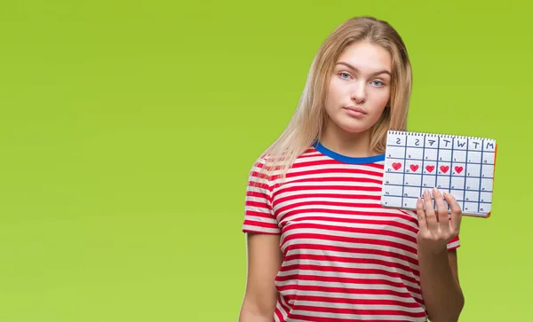 Jonge Kaukasische Vrouw Houdt Van Menstruatie Kalender Geïsoleerde Achtergrond Met — Stockfoto