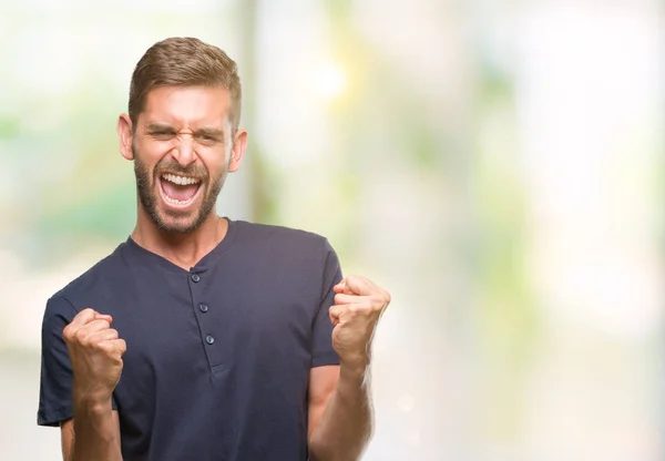 Jonge Knappe Man Geïsoleerde Achtergrond Zeer Gelukkig Opgewonden Doen Winnaar — Stockfoto