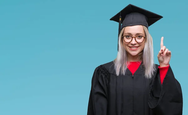 Junge Blonde Frau Uniform Über Isoliertem Hintergrund Mit Erhobenem Zeigefinger — Stockfoto