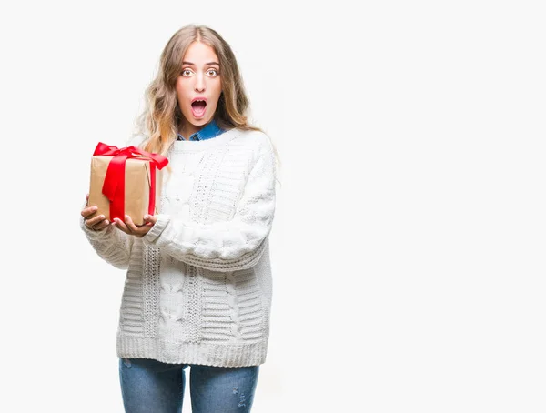 Beautiful Young Blonde Woman Holding Gift Isolated Background Scared Shock — Stock Photo, Image