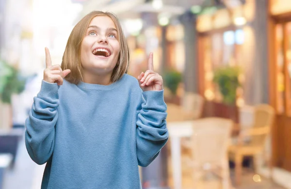 Young Beautiful Girl Wearing Winter Sweater Isolated Background Amazed Surprised — Stock Photo, Image