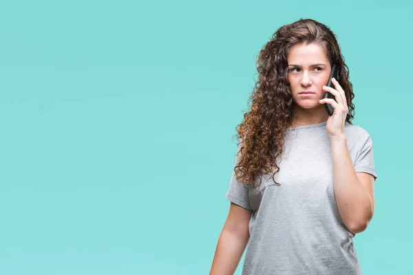 Junge Brünette Mädchen Spricht Auf Dem Smartphone Über Isolierten Hintergrund — Stockfoto