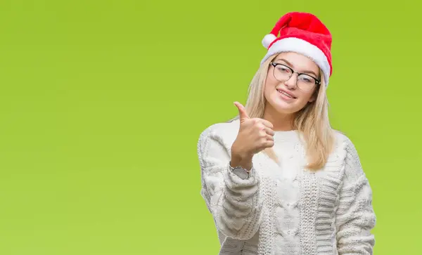 Junge Kaukasische Frau Mit Weihnachtsmütze Über Isoliertem Hintergrund Die Fröhliche — Stockfoto