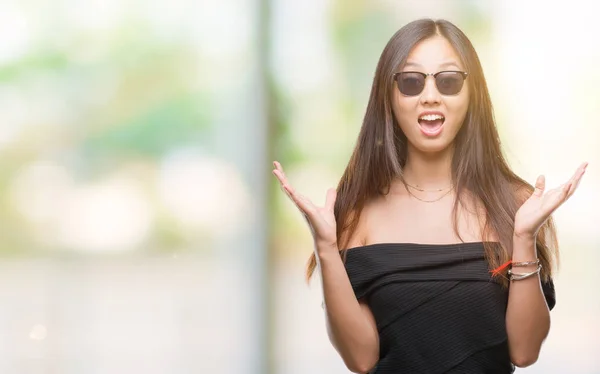 Young Asian Woman Wearing Sunglasses Isolated Background Celebrating Crazy Amazed — Stock Photo, Image