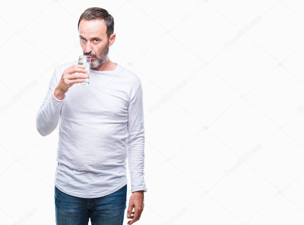 Middle age hoary senior man drinking glass of water over isolated background with a confident expression on smart face thinking serious