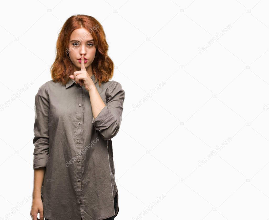 Young beautiful woman over isolated background asking to be quiet with finger on lips. Silence and secret concept.