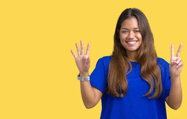 Joven Hermosa Morena Vistiendo Camiseta Azul Sobre Fondo Aislado Mostrando — Foto de Stock