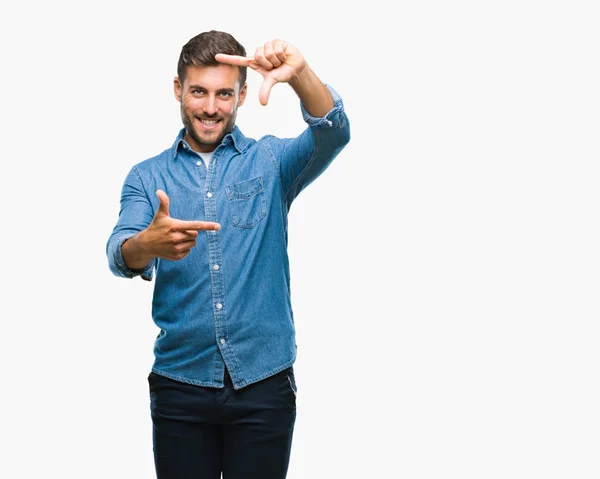 Joven Hombre Guapo Sobre Fondo Aislado Sonriendo Haciendo Marco Con — Foto de Stock