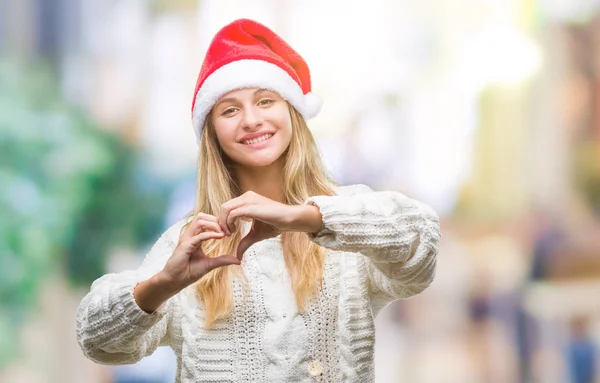 Jonge Mooie Blonde Vrouw Met Kerst Hoed Geïsoleerde Achtergrond Glimlachend — Stockfoto