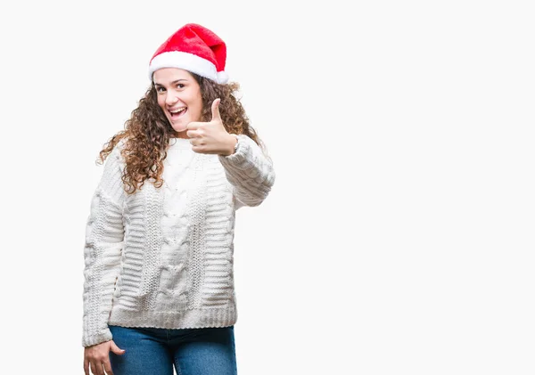 Junges Brünettes Mädchen Mit Weihnachtsmütze Über Isoliertem Hintergrund Macht Glückliche — Stockfoto