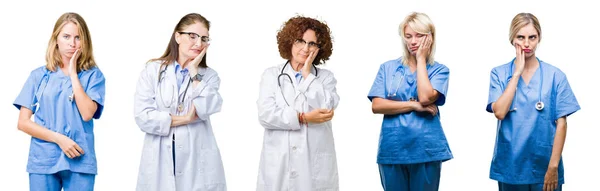 职业医生组女性在白色被隔绝的背景认为看累了并且厌倦了与交叉胳膊的消沉问题 — 图库照片